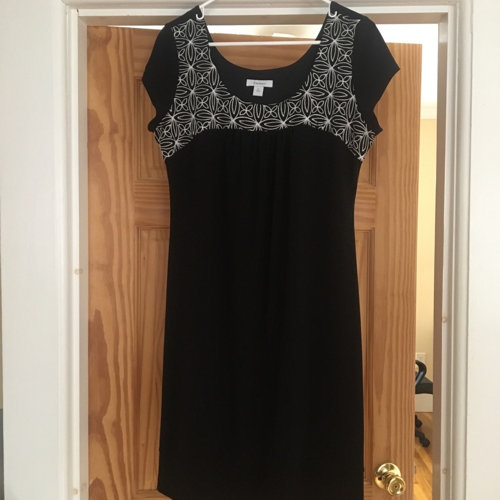 Knee length cap-sleeved little black dress